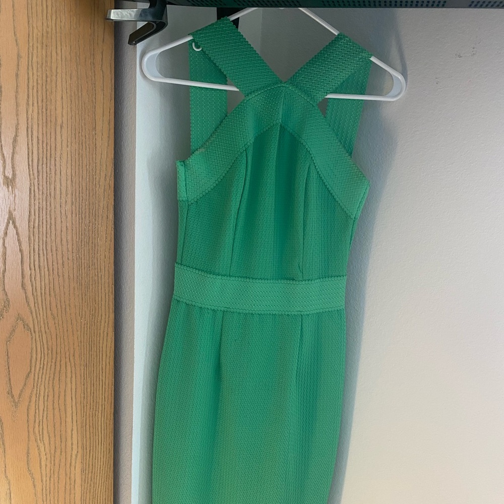 Green tight dress. Used, but in really good condition.